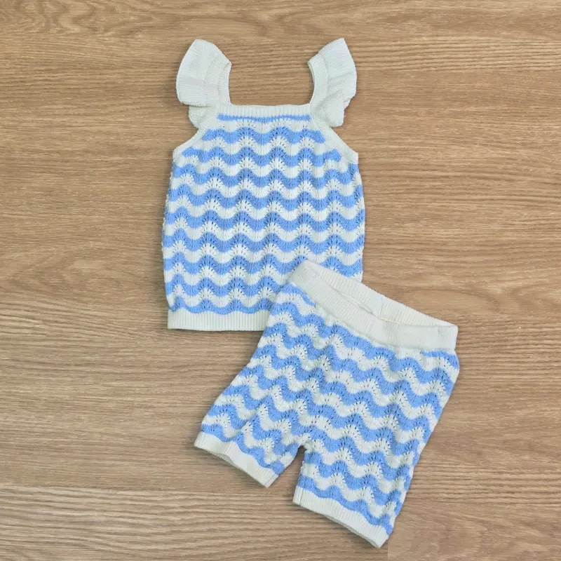 Conjunto bordados azul y beich
