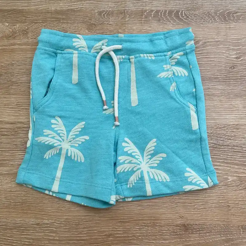 Conjunto color azul con palmeras 
