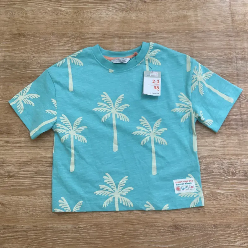 Conjunto color azul con palmeras 