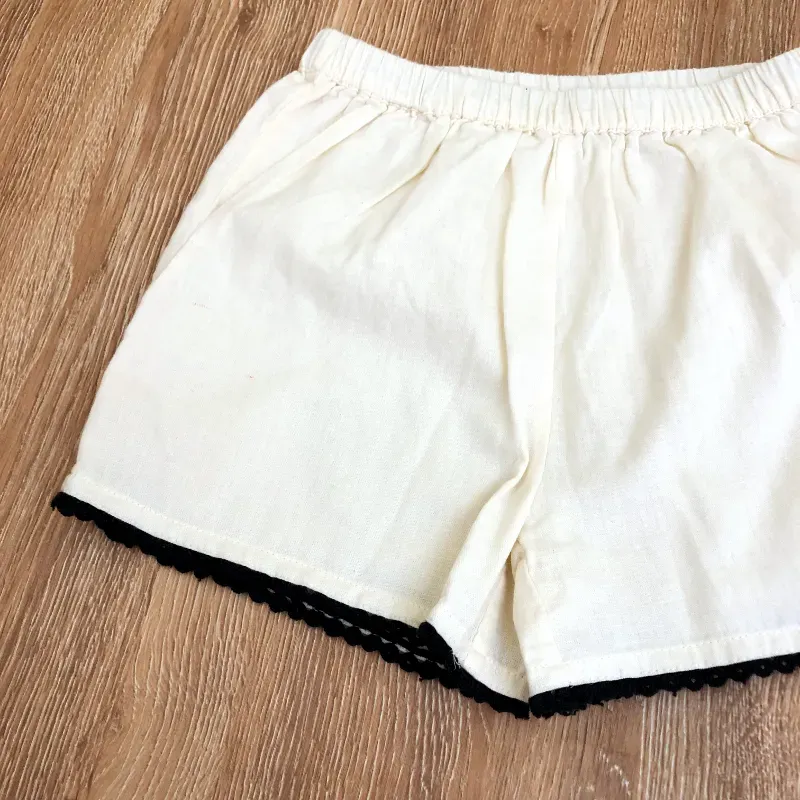Conjunto color crema con parte tejida 