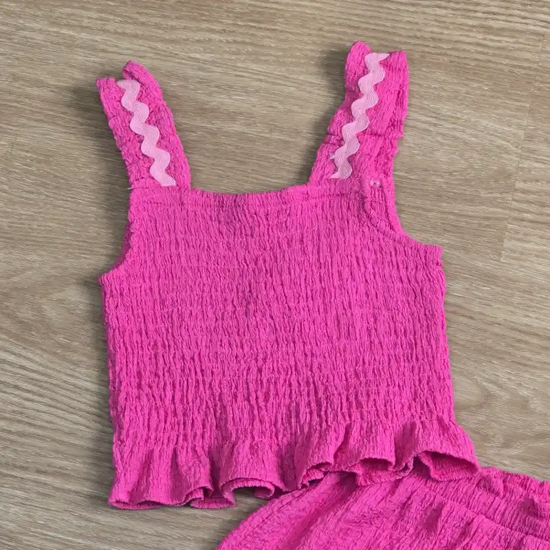 Conjunto color rosado de blusa y short