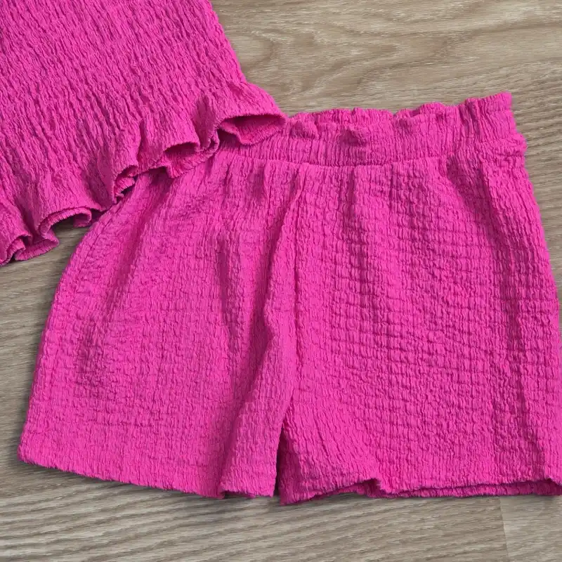 Conjunto color rosado de blusa y short