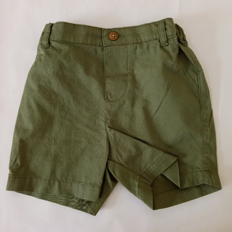 Conjunto color verde con dinosaurios 