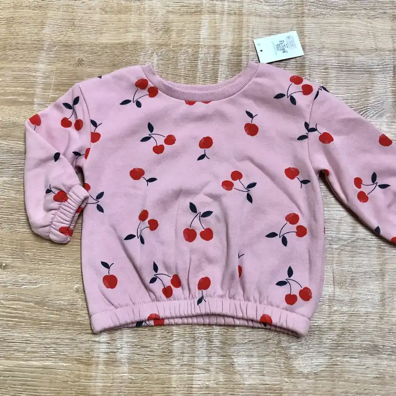 Conjunto con cerezas color rosado 