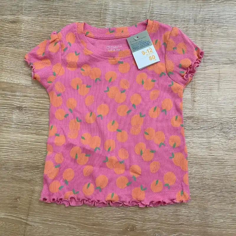 Conjunto de color rosado con naranjas