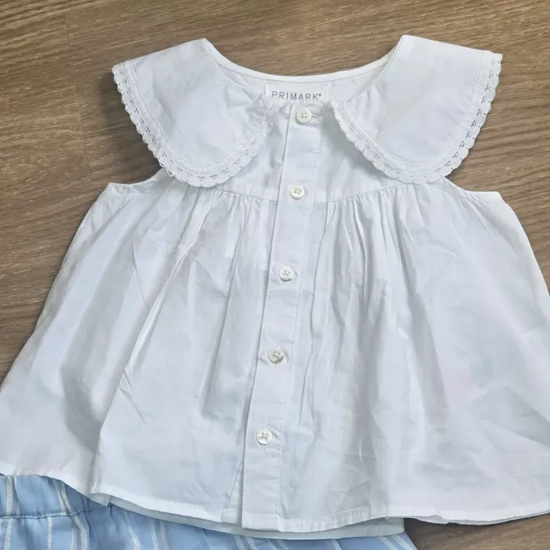 Conjunto de pantalon y blusa blanca