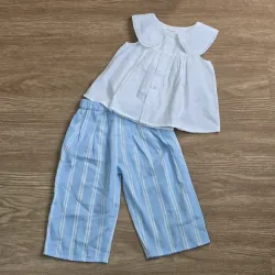 Conjunto de pantalon y blusa blanca