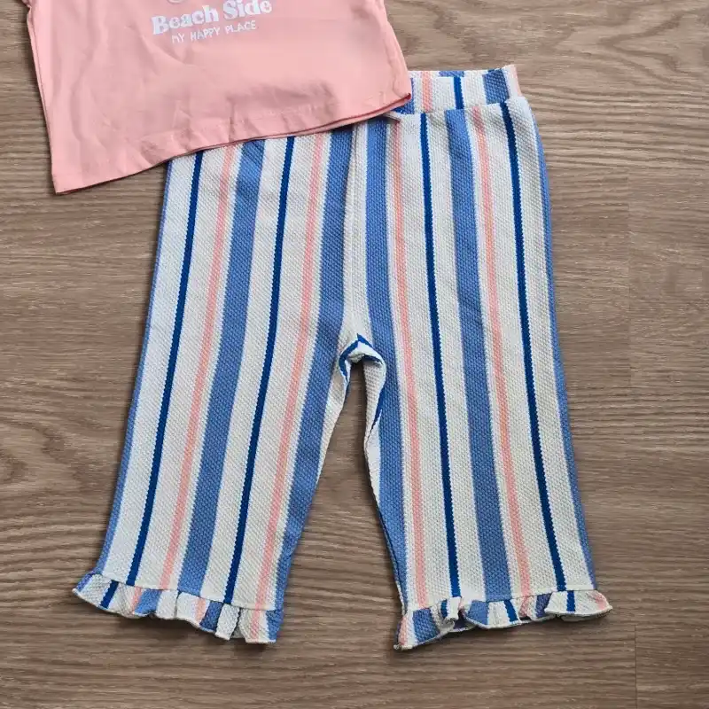 Conjunto de pantaloneta y blusa color naranja