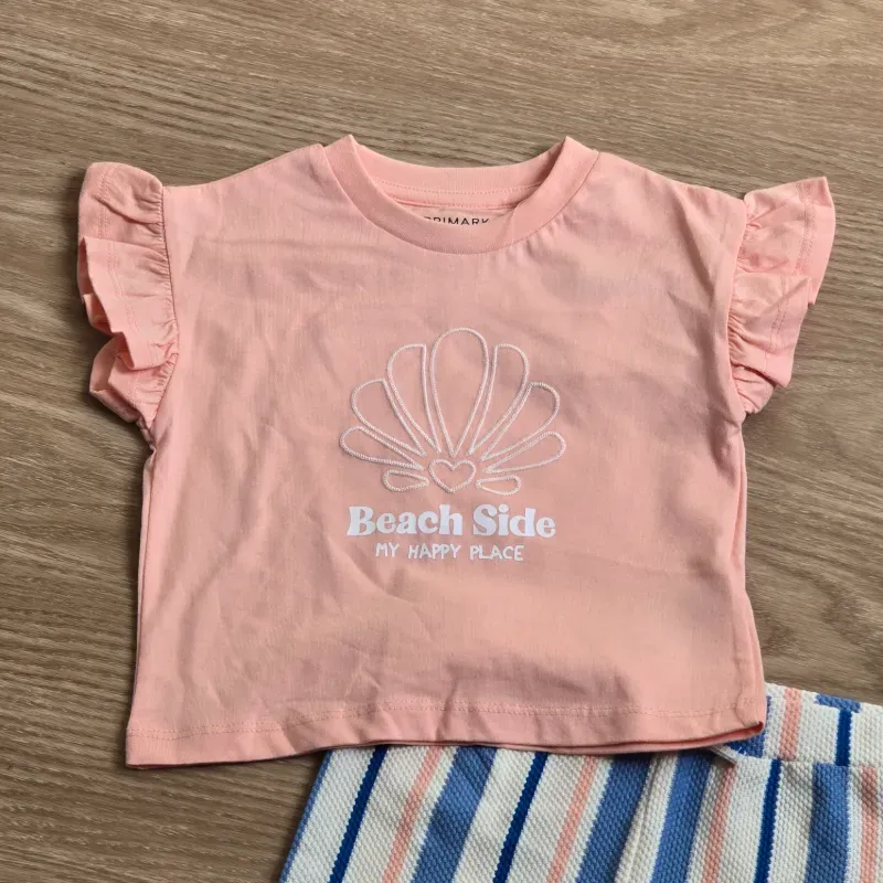 Conjunto de pantaloneta y blusa color naranja