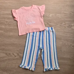 Conjunto de pantaloneta y blusa color naranja