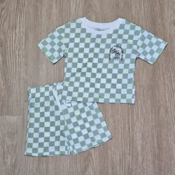 Conjunto de pulover y short de cuadros verdes Veraniego