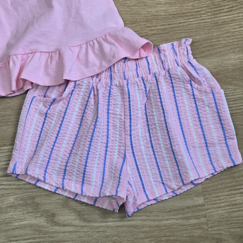Conjunto rosa de blusa y short
