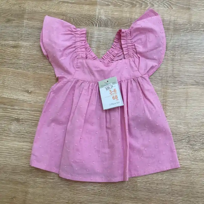 Conjunto rosado y con flores