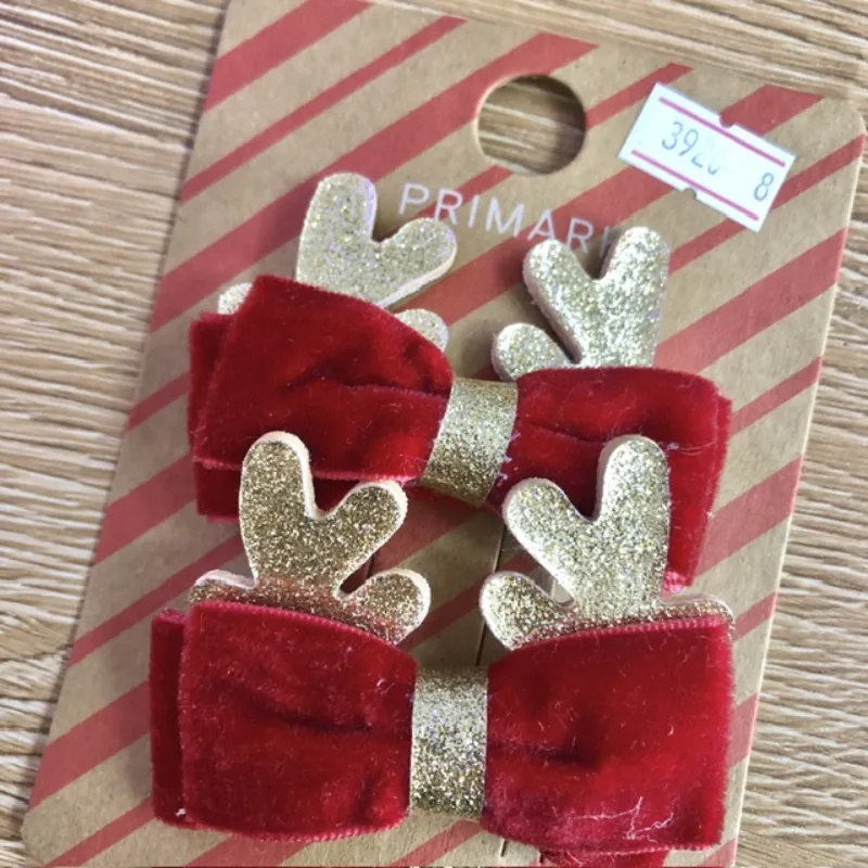 Hebillas con lazos y cuernitos