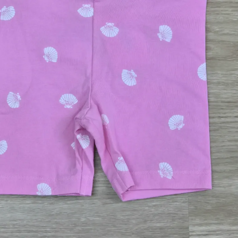 Leggin corto color rosado con conchas