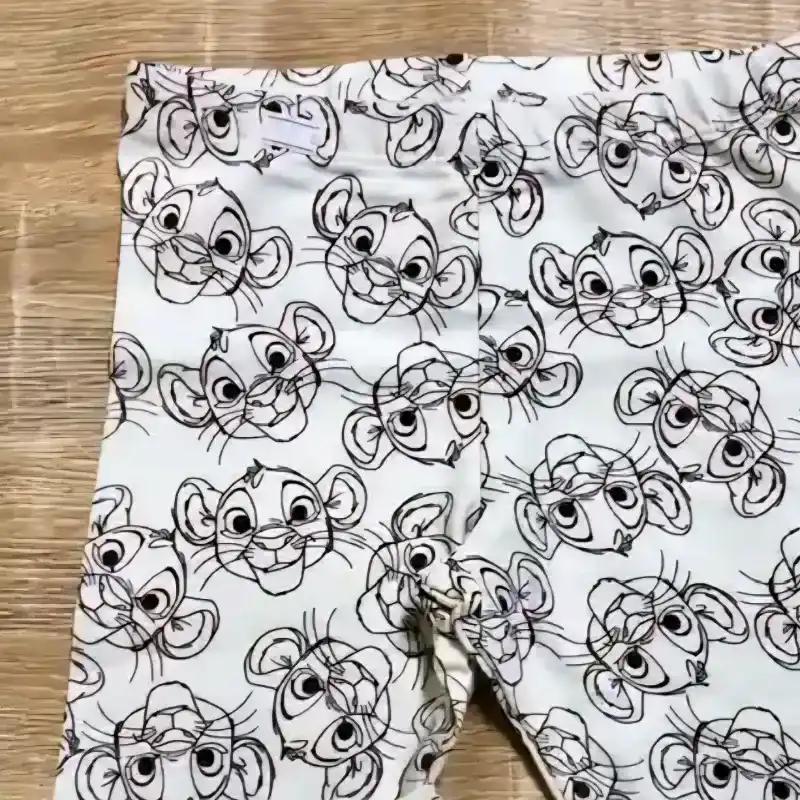 Legging del Rey León color violeta 