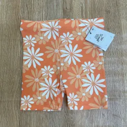 Leggins corta color naranja con flores