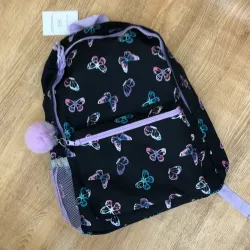 Mochila con mariposas y pompón 