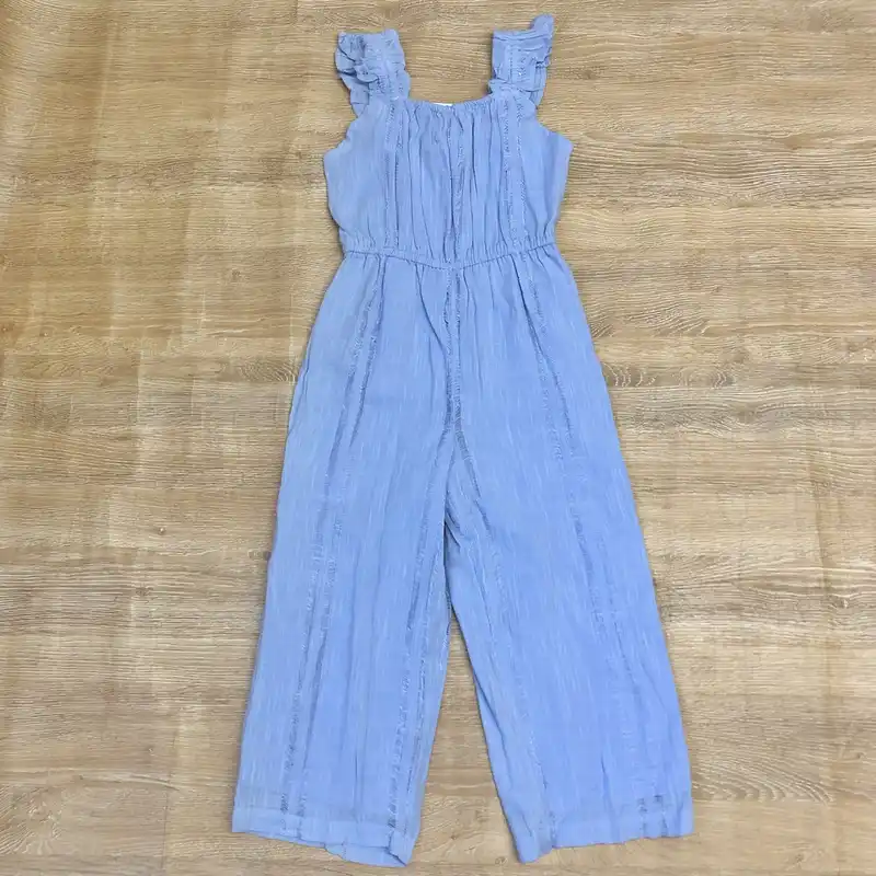 Mono de patas largas color azul