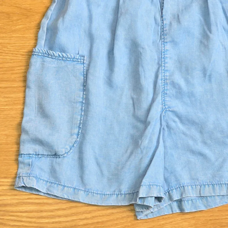 Mono short estilo mezclilla con bolsillos