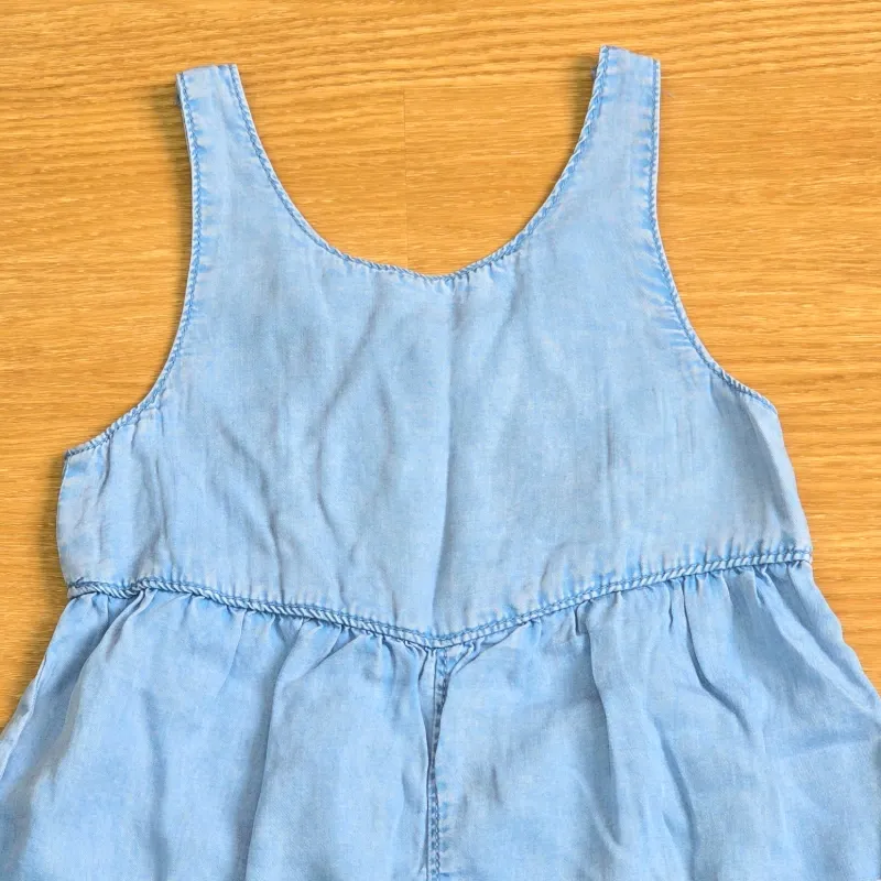 Mono short estilo mezclilla con bolsillos
