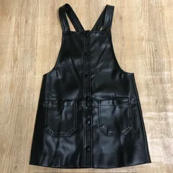 Overol Mango de cuero sintético color negro 