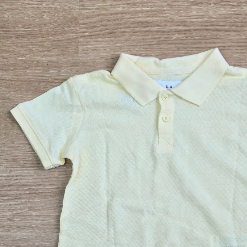 Polo color amarillo básico