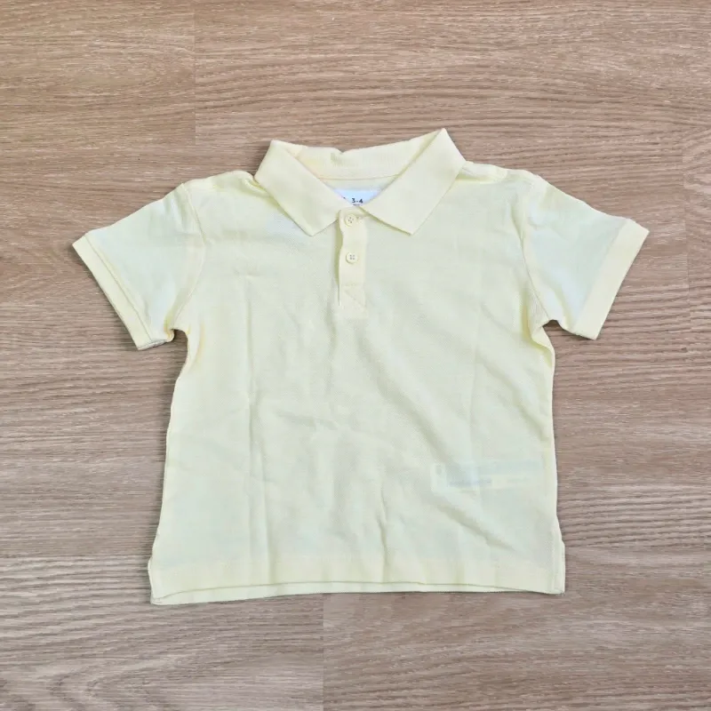 Polo color amarillo básico