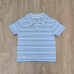 Polo color azul con rayas