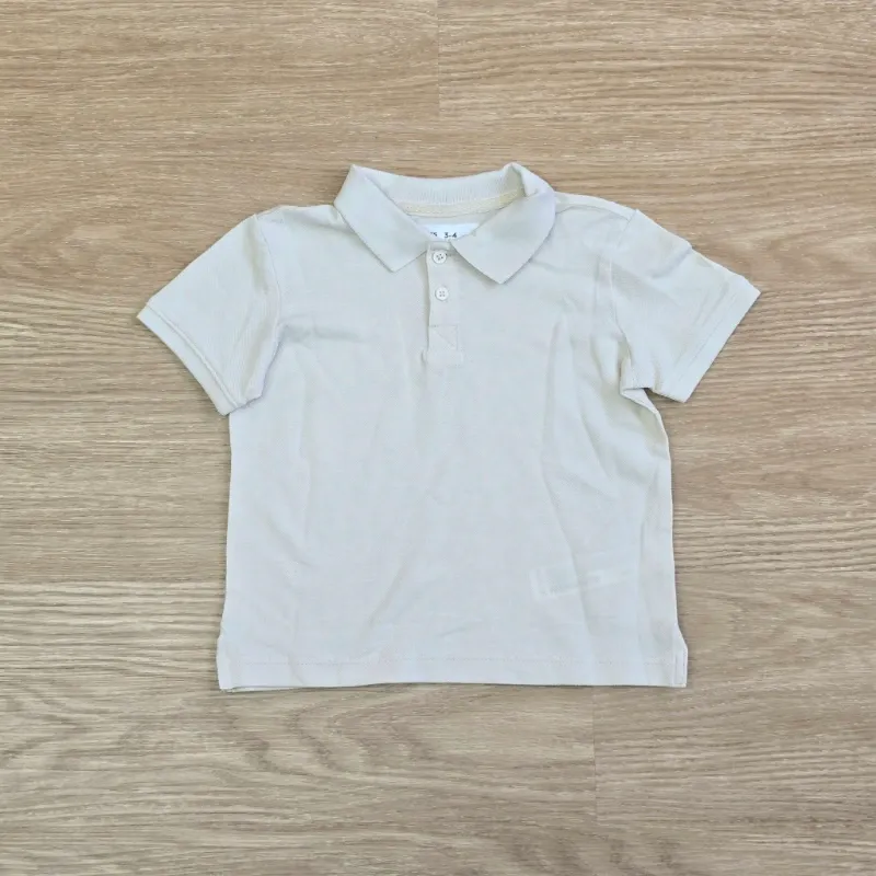Polo color beich básico