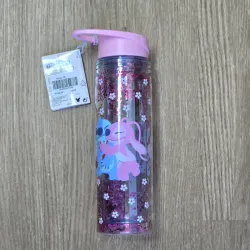 Pomo rosado de Stich y Angel con flores blancas