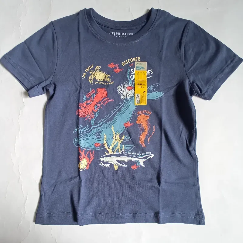 Pulóver azul oscuro con animales marinos