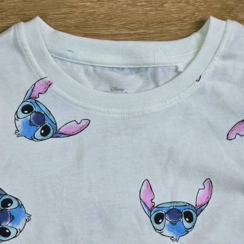 Pulover blanco caritas Stich azules