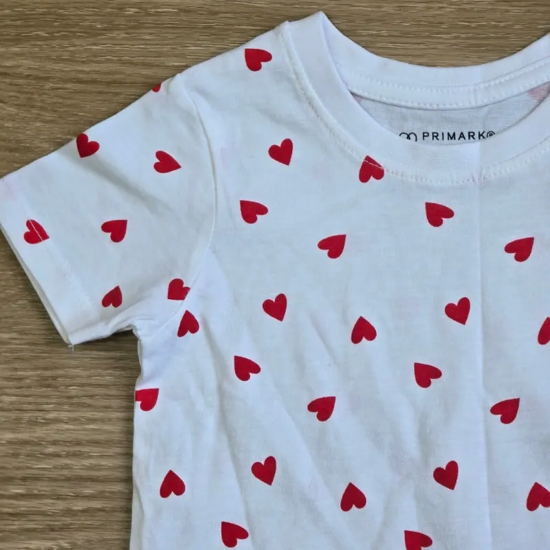 Pulover blanco con corazones