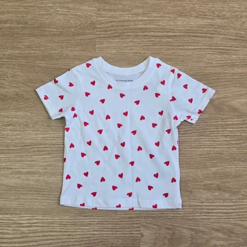 Pulover blanco con corazones