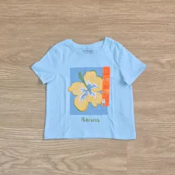 Pulover color azul con flores amarilla