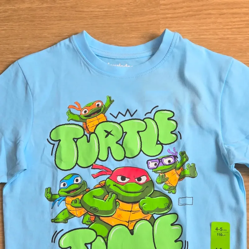 Pulover color azul de las Tortugas Ninjas