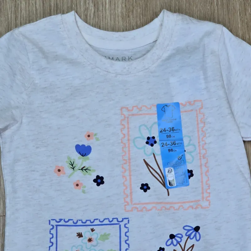 Pulover color beich con flores