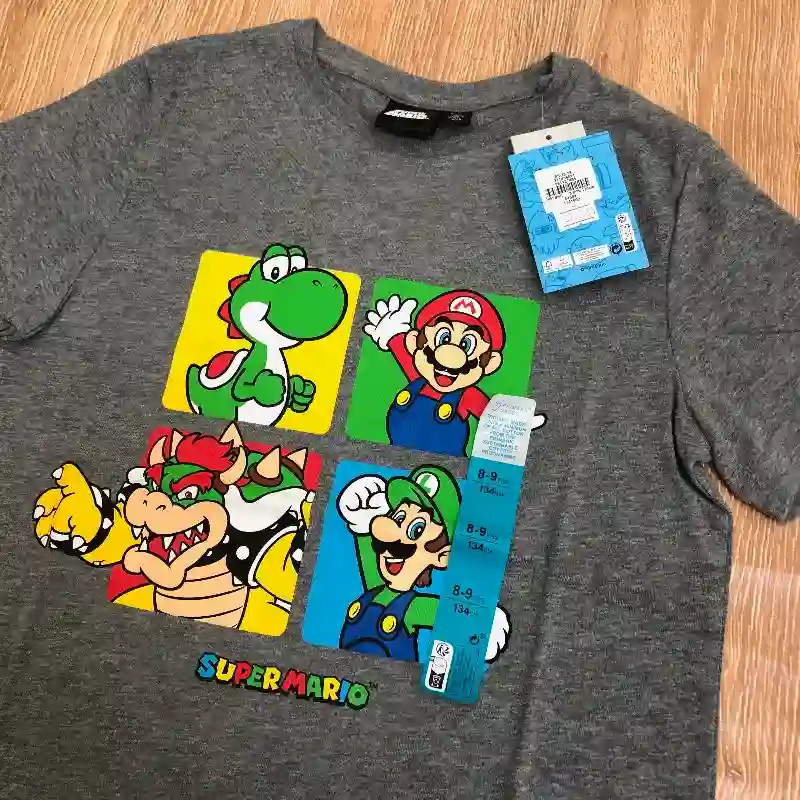Pulóver color gris con Super Mario 