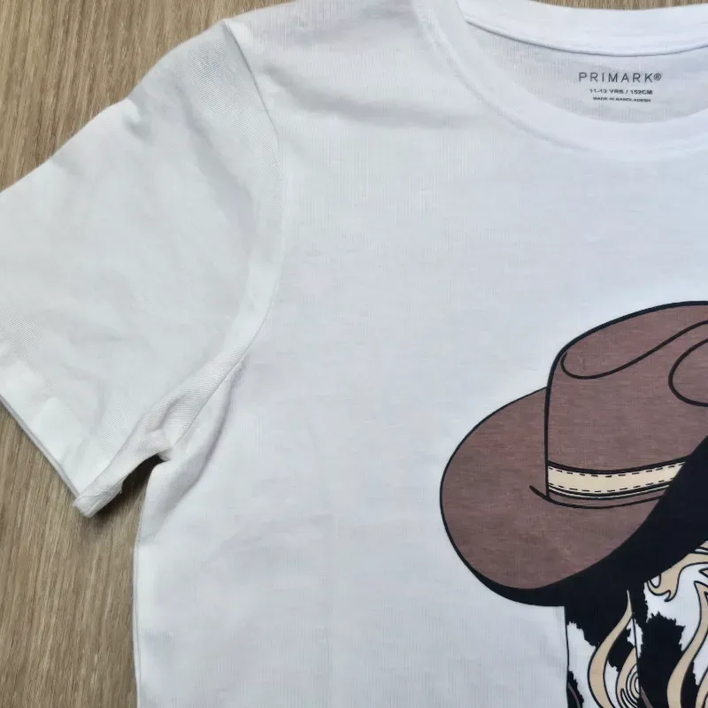 Pulóver con bota de vaquero 