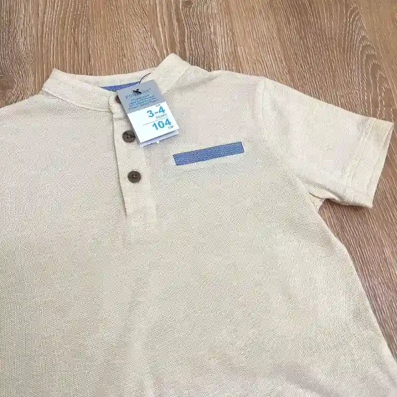 Pulóver con cuello chino color crema