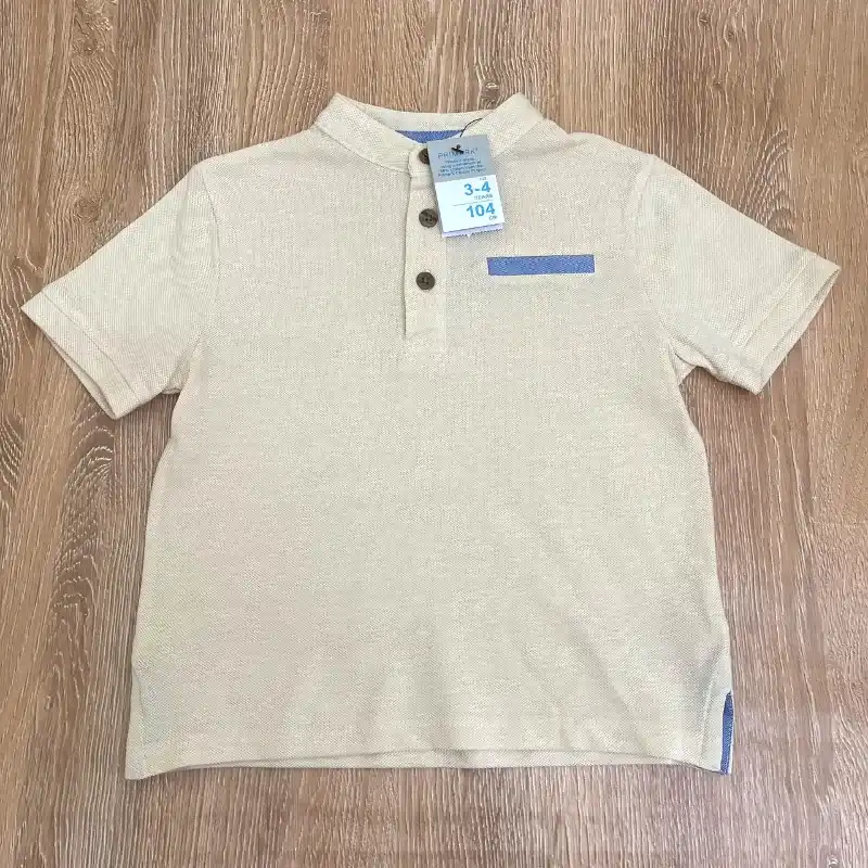 Pulóver con cuello chino color crema
