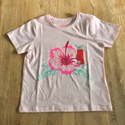 Pulóver con flor en el centro color rosado 