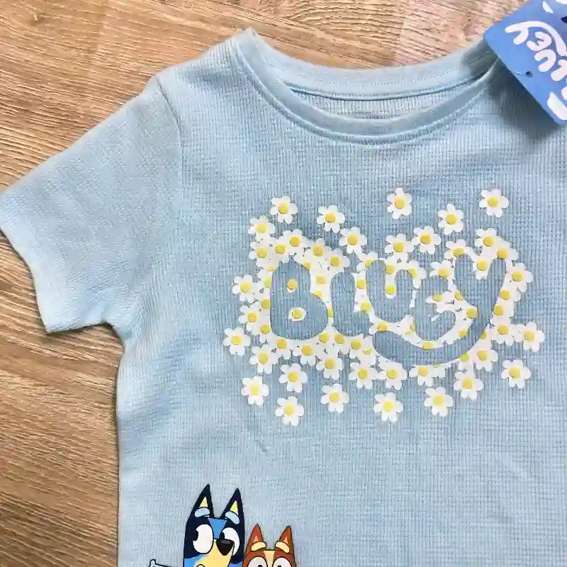 Pulóver de Bluey con flores