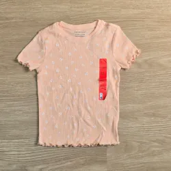 Pulover de Canalé color naranja con corazones