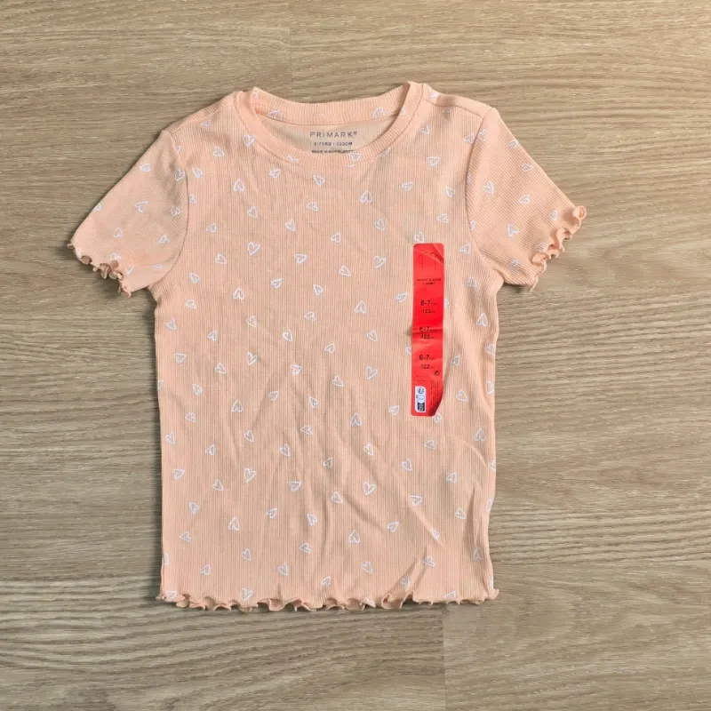 Pulover de Canalé color naranja con corazones