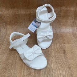 Sandalias color blanco con lazo 