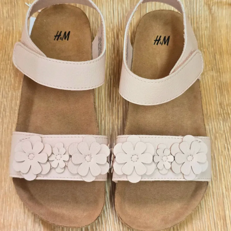 Sandalias de pegueta rosa con flores