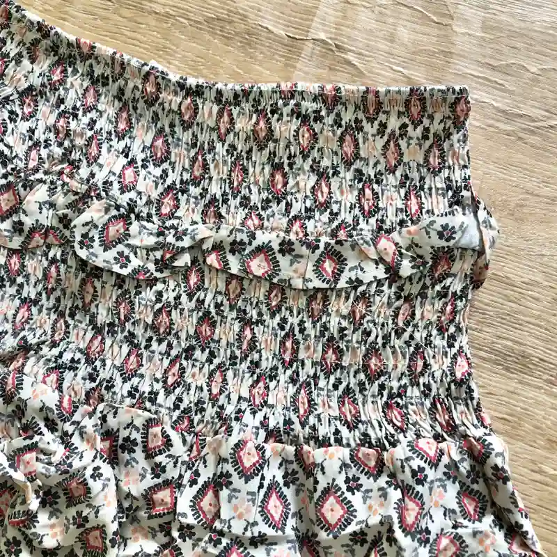 Saya con estampado de colores 