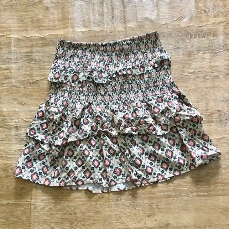 Saya con estampado de colores 